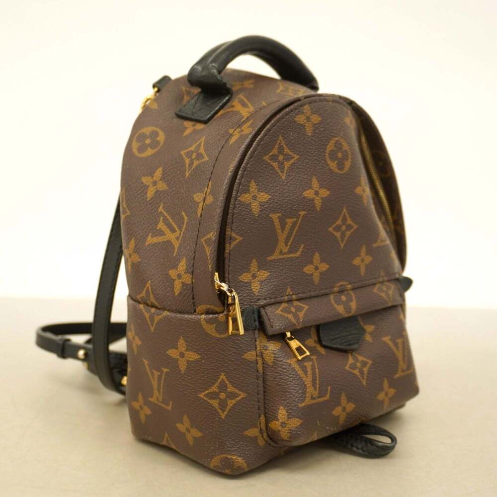 LOUIS VUITTON Brown Monogram Backpack - Picture 2 of 13